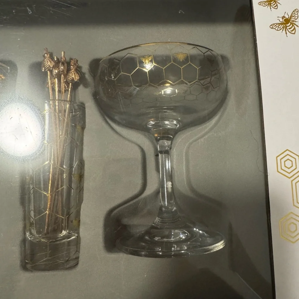 Williams Sonoma coupe glasses, cocktail picks, and holder
